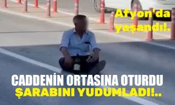 Afyon'da ilginç olay!.. Caddenin üzerinde şarap içti!..