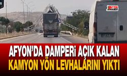 Afyon’da damperi açık kalan kamyon yön levhalarını yıktı