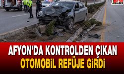 Afyon'da kontrolden çıkan otomobil refüje girdi