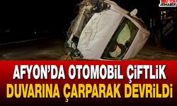Afyon’da otomobil çiftlik duvarına çarparak devrildi
