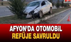 Afyon’da otomobil refüje savruldu