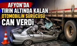 Afyon'da tırın altında kalan otomobilin sürücüsü can verdi
