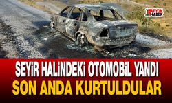 Seyir halindeki otomobil yandı, son anda kurtuldular