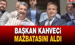 MHP’de Başkan Kahveci mazbatasını aldı