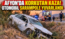 Afyon’da korkutan kaza! Otomobil şarampole yuvarlandı