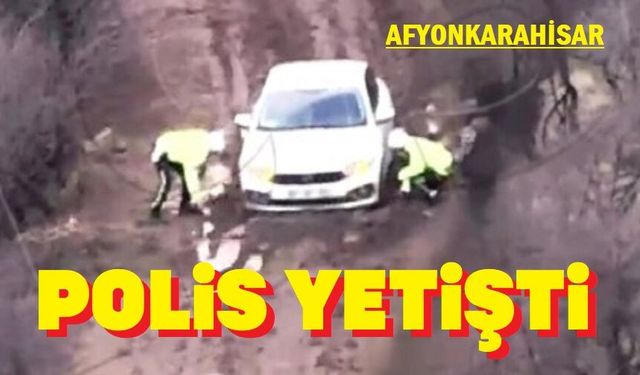Çamura saplanan sürücünnü imdadına polis yetişti