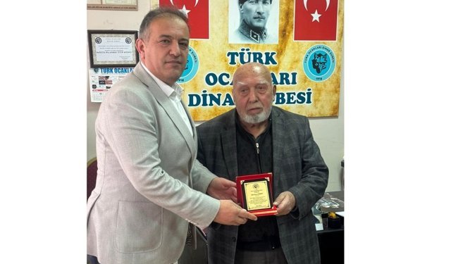 Dinar'da duayen gazeteciye vefa