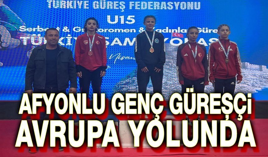Afyonlu genç güreşçi şampiyonluk kürsüsünde