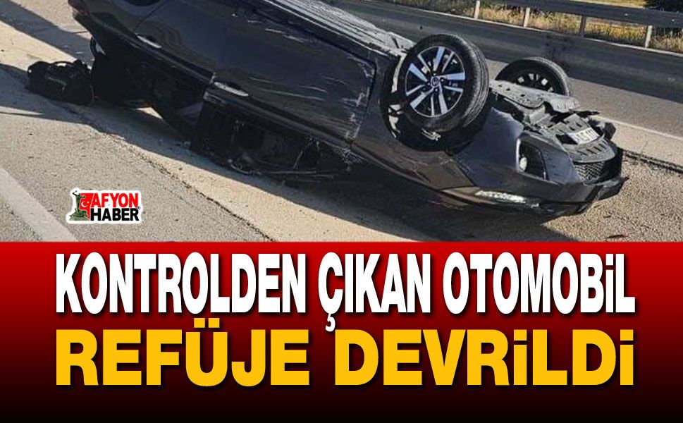 Kontrolden çıkan otomobil refüje devrildi
