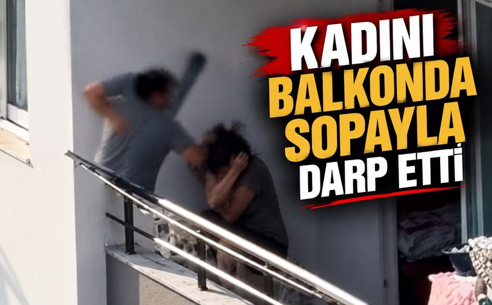 Kadını balkonda sopayla darp etti
